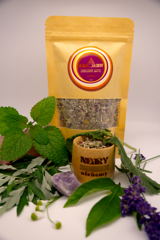 Dreamluxe Herbal Tea package with various herbs and amethyst crystal.